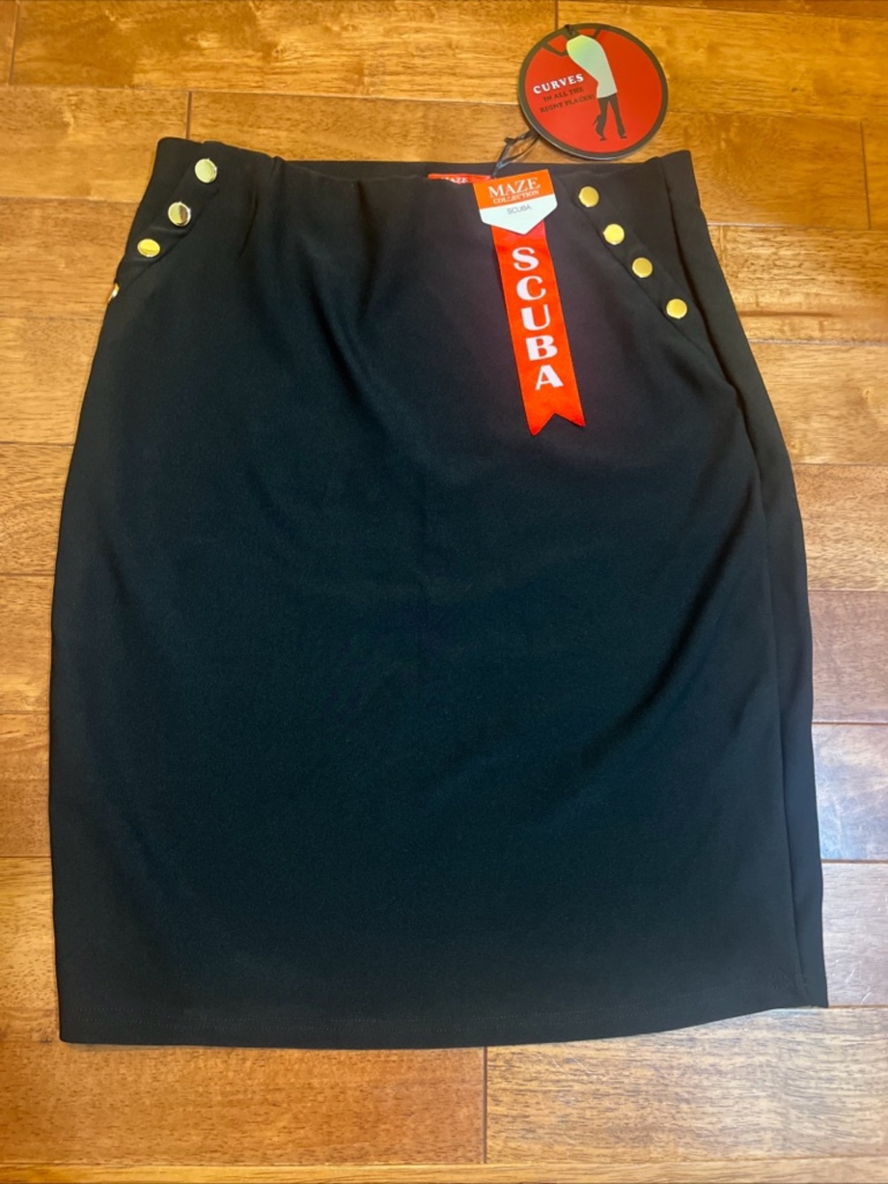 Maze Collection black scuba pencil skirt w/eye-catching gold-tone buttons